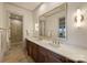 Bathroom with double sink vanity, large mirror, and enclosed shower at 16909 Jetton Rd, Cornelius, NC 28031