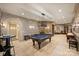 Recreational space featuring a pool table and travertine floors at 16909 Jetton Rd, Cornelius, NC 28031