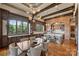 Spacious kitchen with brick archway, center island, granite counters, and stainless appliances at 16909 Jetton Rd, Cornelius, NC 28031