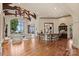 Open living area with hardwood floors, bar, comfortable seating, and lake views at 16909 Jetton Rd, Cornelius, NC 28031
