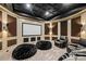 Home theater with comfortable seating and large screen at 16909 Jetton Rd, Cornelius, NC 28031