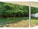 Lush backyard with mature trees and a shed for extra storage at 1961 Leesburg Dr, Clover, SC 29710