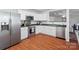 Modern kitchen featuring stainless steel appliances and white cabinets at 1961 Leesburg Dr, Clover, SC 29710