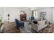 Cozy living room with a fireplace, hardwood floors, and modern decor at 1961 Leesburg Dr, Clover, SC 29710