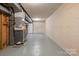 Unfinished basement featuring concrete floors, open space and ready for customization at 218 Kingsway Cir, Charlotte, NC 28214