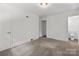Bedroom featuring neutral carpet and ensuite bathroom at 218 Kingsway Cir, Charlotte, NC 28214