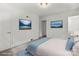 Bright bedroom featuring neutral walls, carpet floors and natural landscapes on the walls at 218 Kingsway Cir, Charlotte, NC 28214