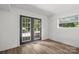 Finished room with double door access to exterior and a window at 218 Kingsway Cir, Charlotte, NC 28214