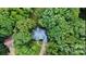 Aerial view of a home nestled among mature trees and landscaping at 26056 Neptunes Lndg, Fort Mill, SC 29708