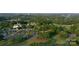 Aerial view of neighborhood clubhouse, parking and golf course at 26056 Neptunes Lndg, Fort Mill, SC 29708