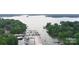 Wide aerial view of a waterfront property with marina and various boats at 26056 Neptunes Lndg, Fort Mill, SC 29708