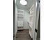 Organized walk-in closet with built-in shelving and drawers for ample storage space at 26056 Neptunes Lndg, Fort Mill, SC 29708