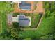 Aerial view of the home's exterior showing the backyard layout, landscaping, driveway and overall property at 2913 Lake Ave, Charlotte, NC 28208