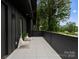 A tiled balcony area showcasing modern design elements at 2913 Lake Ave, Charlotte, NC 28208