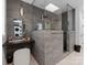 Modern bathroom features a glass shower, vanity area, and modern lighting at 2913 Lake Ave, Charlotte, NC 28208