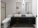 A modern bathroom with dual sinks and a stylish design at 2913 Lake Ave, Charlotte, NC 28208