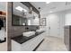 Modern bathroom with a double vanity, square sinks, and large framed mirror at 2913 Lake Ave, Charlotte, NC 28208