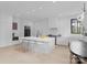 Contemporary kitchen featuring a spacious island with seating, modern appliances, and ample counter space at 2913 Lake Ave, Charlotte, NC 28208