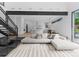Open-concept living space featuring a sleek kitchen, dining area, and comfortable seating, with stylish modern decor at 2913 Lake Ave, Charlotte, NC 28208