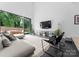 Spacious living room with a large window and modern furniture at 2913 Lake Ave, Charlotte, NC 28208