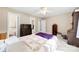 A comfortable bedroom with furniture and natural light from the windows at 322 Killian Rd, Stanley, NC 28164