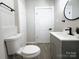 Modern bathroom featuring tiled floors, stylish fixtures, and a sleek vanity at 330 17Th Nw St, Hickory, NC 28601
