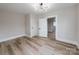 This bedroom features an abundance of natural light and hardwood floors throughout the space at 330 17Th Nw St, Hickory, NC 28601