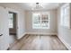Bright bedroom offers hardwood floors, large windows, and ample space, creating an inviting retreat at 330 17Th Nw St, Hickory, NC 28601