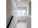 Hallway features plank flooring and a double door closet, offering ample storage at 330 17Th Nw St, Hickory, NC 28601