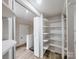 Hallway with open shelving on the side, offering storage and functionality at 330 17Th Nw St, Hickory, NC 28601