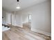 Open-concept living room features hardwood floors and a seamless transition to other living spaces at 330 17Th Nw St, Hickory, NC 28601