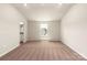 Spacious bedroom with plush carpeting, natural lighting, and a glimpse into the bathroom at 3320 Burberry Dr, Gastonia, NC 28052