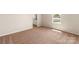 Bright bedroom features a neutral color palette, large window, and adjoins the kitchen at 3320 Burberry Dr, Gastonia, NC 28052