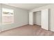 Bedroom with closet space, plush carpet and a window with a view at 3331 Burberry Dr, Gastonia, NC 28052