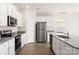 Well-equipped kitchen featuring stainless steel appliances and granite countertops at 3331 Burberry Dr, Gastonia, NC 28052