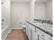 Bathroom featuring a large mirror, and granite countertops at 3334 Strong Box Ln, Gastonia, NC 28052
