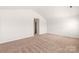 Spacious bedroom with plush carpeting and neutral paint, creating a relaxing retreat at 3334 Strong Box Ln, Gastonia, NC 28052