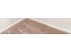 An extreme close up of the floor and baseboards in the bedroom at 3334 Strong Box Ln, Gastonia, NC 28052
