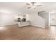 Open-concept living space with wood floors, recessed lights, and eat-in kitchen area at 3334 Strong Box Ln, Gastonia, NC 28052