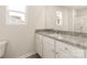 Bathroom featuring granite countertop vanity with storage and a separate glass-enclosed shower at 3342 Strong Box Ln, Gastonia, NC 28052