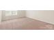 Clean bedroom with neutral carpet, bright natural light and lots of room at 3342 Strong Box Ln, Gastonia, NC 28052