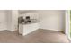 Modern kitchen featuring stainless steel appliances, granite counters, and white cabinetry at 3342 Strong Box Ln, Gastonia, NC 28052