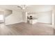 Spacious living area with luxury vinyl flooring, recessed lighting and an open-concept design at 3342 Strong Box Ln, Gastonia, NC 28052