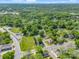 Wide aerial shot showcasing the neighborhood and the home's proximity to local amenities at 411 W Sycamore St, Lincolnton, NC 28092