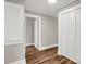 Hallway featuring wood-look floors and a closet on the right at 411 W Sycamore St, Lincolnton, NC 28092