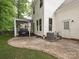 Backyard view showcasing a patio, white siding, and an air conditioning unit at 4315 Poplar Grove Dr, Charlotte, NC 28269