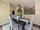 Dining room showcases elegant lighting, gray chairs, and is conveniently located near the living room at 4315 Poplar Grove Dr, Charlotte, NC 28269