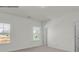 Bright bedroom with two windows providing ample natural light and neutral wall paint at 483 Shasta St # 5202, Gastonia, NC 28052