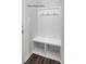 Functional mudroom featuring a built-in storage bench with coat hooks and shelving at 483 Shasta St # 5202, Gastonia, NC 28052