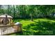 Expansive backyard featuring a deck with gazebo, creating a perfect outdoor retreat at 4941 Southview Dr, Hickory, NC 28602